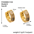 Orecchini huggie in acciaio dorato con zirconi bianchi marroni e neri incastonati - Zirconia Nera (Medio)