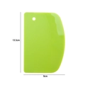 Green plastic dough scraper with hanging hole, 13.5cm x 9cm baking tool size view - D-shape Scraper / Green