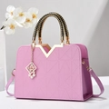 Chic lavender handbag with geometric triangular pattern and woven ring handle - Pink Purple