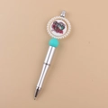 Detail of silver beaded pen featuring CNA medical emblem and faux pearl decoration - Medical Heart CNA/Silver Barrel