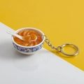 Miniature blue floral ceramic bowl keychain with realistic orange segments and syrup - No.16 Orange (Model)