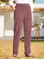 Detail of dusty pink corduroy pants showing elastic waist and large side pockets - S / Bottoms / Red