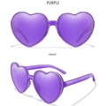 Fashionable purple heart-shaped sunglasses with a transparent frame and stylish design - Purple Frame / Purple Lens