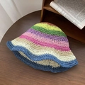 Rainbow striped straw sun hat for women with wide brim on a rustic wooden table - Rainbow Stripe Straw Hat Royal Blue Edge