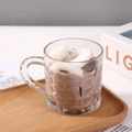 Glass cup scented candle featuring chocolate-colored wax and white cream topping - Style 2
