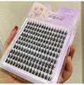 Close-up of high-capacity individual cluster eyelashes in a compact pink storage case - Large Capacity Wheat Ear 12MM