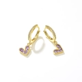 Detail of gold heart earrings featuring purple cubic zirconia stones on white background - Purple