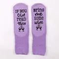 Purple coral fleece sleep socks with non-slip wine quote text on the soles - One Size / Purple + Black Glue