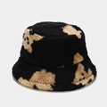 Detailed view of black fuzzy sherpa bucket hat with cute khaki bear pattern texture - M (56-58cm) / Black