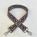 Detail view of leopard print wide strap for crossbody bag with adjustable silver hardware - Pattern 48 Silver Clasp