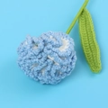 Detailed view of hand-knitted blue and white carnation flower with crochet textures - Finished Carnation Stems (gradient Blue)