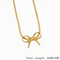 Détail collier nœud doré poli avec chaîne ajustable de 36cm plus une extension de 5cm - Collier chaîne serpent nœud papillon (DDK1065) / Or