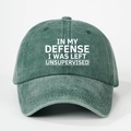 Detailed close-up of retro washed cotton baseball cap with white printed text embroidery - Dark Green