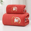 Detailed embroidery of a cartoon rabbit on a soft red coral fleece bath towel surface - Moon Rabbit Wine Red