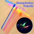 LED light-up helicopter toy with bright colorful propellers in blue pink yellow and orange - Glowing Dragonfly