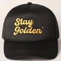 Black trucker hat with yellow Stay Golden embroidery and adjustable mesh back design - One Size / Black