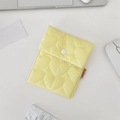 Bright yellow quilted heart pattern mini storage bag with button closure and brand label - Heart Quilted Yellow Sanitary Bag