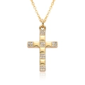 Macro detail of golden cross necklace with micro-pave crystals and polished finish - Minimalist Clear Stone Cross (B239)