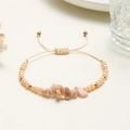 Handgefertigtes Armband mit pfirsichfarbenen Natursteinen und goldfarbenen Perlen, verstellbar - Hellrosa