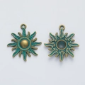 Vintage bronze sun charms in antique alloy for DIY jewelry making, front and back view - Antique Green