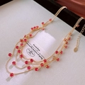 Close-up of layered gold chain necklace featuring elegant red gemstone charms on card - 21# Necklace-Gold-Red Gemstone Style