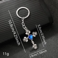 Gothic rose cross keychain in silver alloy with a heart-shaped blue gemstone pendant - Blue 010-6 (Rose Blue Heart Gem Cross)