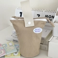 Cute beige corduroy pencil case with handle and Rosy Rosy patch on a cozy desk setup - Warm Brown