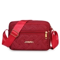 Red quilted crossbody bag with heart patterns and adjustable wide shoulder strap - One Size / Red