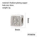 Detailed macro of letter D zircon bead with rhodium plating and 4mm hole diameter - Letter D (PT0554)