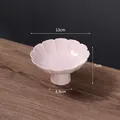 Pink petal-shaped ceramic fruit plate with footed base and elegant glazed finish - Fragrance Petal-Ceramic Pink
