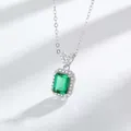 Macro shot of an emerald-cut green pendant with brilliant white diamond halo setting - Emerald Green Necklace (Silver V)