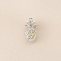 Macro shot of silver pineapple pendant with yellow zircons and 18K gold plated detail - Silver (Pineapple)