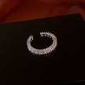 Macro detail of silver open ring featuring a row of square-cut cubic zirconia stones - 15# Ring - Silver - Rectangle Zircon