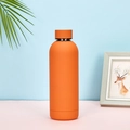 Portable matte orange stainless steel water bottle with sleek cylindrical design - Pastoral Orange