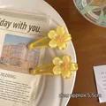 Set of two cute yellow flower hair clips with pink centers and matte finish, size 5.5cm - 5# Yellow Sakura