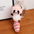 Pink and white plush raccoon keychain with striped tail and metal ring, 18.5cm tall - Dusky Pink