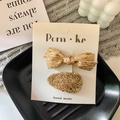 Golden sequin bow and glitter oval hair clip set for girls on a white display card - Bow + Geometric