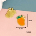 Detail view of mini mango alloy pendant with 13x11mm dimensions and 0.6g weight - Mango (7)