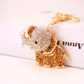 Golden elephant keychain with amber rhinestones and sparkling crystals for women's bags - Light Coffee