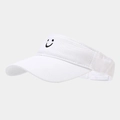 Detail of white sun visor hat featuring a black smiley face embroidery and canvas texture - White