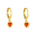 Close-up of golden hoop earrings featuring vibrant orange heart-shaped zircon pendants - Orange