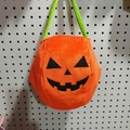 Plush pumpkin candy basket in bright orange with green handle for Halloween treats - Medium Orange