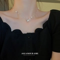 Silver butterfly necklace with delicate pearls and clear line on elegant model's neck - 17# Necklace - Silver