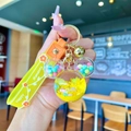 Detail of yellow Mickey liquid quicksand keychain with Happy Moments wrist strap - Yellow Luminous Snowflake Mickey Head