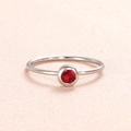 Minimalist silver stainless steel ring featuring a round red birthstone in a bezel setting - US Size 7 / Steel-Red (Jan)