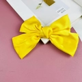 Elegant large yellow satin bow hair clip with a smooth glossy fabric finish - Light Yellow (Spring Clip)