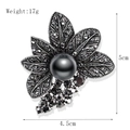 Vintage style black flower brooch with rhinestones and central pearl detail - Black Floral (xz4140)