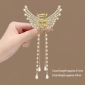 Detailed view of golden wing hair claw clip with crystal rhinestones and pearl tassels - Gold Wings Pearl Tassel Claw Clip