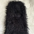 Detail of black balaclava showing soft feather yarn texture and eye hole opening - One Size / Black