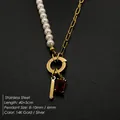 14K gold plated stainless steel necklace featuring imitation pearls and a red gemstone pendant - Gothic Letter L
